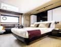Comfortable: The owner sleeps amidships in a free-standing bed.