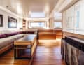 Owner's cabin: Hull windows, light-coloured walls and a Braque painting disguise the ceiling height