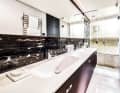 : Shiny marble surfaces in the bathroom.