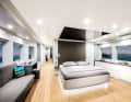 Owner's suite, view towards the bridge: The Gumbiller family worked with Burçin Akın, who has designed numerous interiors for Tansu Yachts, to create modern rooms in grey and white. A private outdoor deck with flybridge access is located aft.