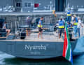 A 4.50 metre tender is parked at the rear. With the platform folded down, there is an 8.5 square metre beach area