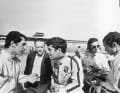 Daytona 1969, die Jagd auf den ersten WM-Titel beginnt. Vier der schnellsten Männer der Welt fahren Porsche: Vic Elford, Brian Redman, Jo Siffert und Jacky Ickx (v. l.). Versuchschef Helmuth Bott (2. v. l.) ist der Chef der Mission.