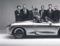 Die Boxster-Crew von links nach rechts: Grant Larson (Exterieur), Jörg Kirschbaum (Modellkonstrukteur), Otto Geffert (Designingenieur), Dorothea Müller-Goodwin (Color and Trim), Klaus Ziegler (Modellkonstrukteur), Stefan Stark (Interieur), Peter Müller (Chefmodelleur). Im Auto: Designchef Harm Lagaaij