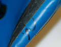 Locate and mark the leak. This can also be sealed with a drop of adhesive prior to the repair.