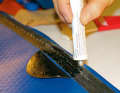 Apply the soft plastic adhesive to both surfaces and leave to dry for at least five minutes.