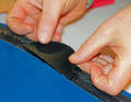 Glue the patch to the pre-roughened area with the leak.