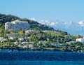 Although the Maritime Alps tower over Cannes, the celebrity city is spared the strong winds - something stand-up paddlers love to hear.