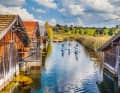 A narrow canal quickly leads from the alternative entry point at the harbour in Seehausen between old boathouses and tall reeds into the lake.
