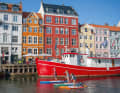 Everything is so colourful here, Phine, Paulina and Kai visiting Copenhagen's Nyhaven.