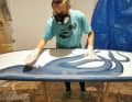 Everything is sanded down before the ‘hot coat’ is applied to the underside.
