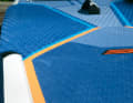 The deck pad is padded on the sides and thus widens the standing area.