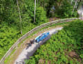 What does the heavy load actually do to the brakes downhill?