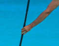 The arm should remain stretched during the pulling phase.