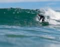 Andy and his boards clearly feel at home in the waves of Cape Town.