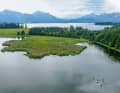 Forggensee (background) and Illasbergsee (foreground) are idyllically embedded in the Allgäu.