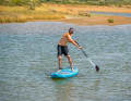 Use the rotation of your shoulders and keep your centre of gravity low (knees half-bent) to guide the paddle and keep your balance