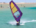The tack to leeward is important because it reduces the sail draft and thus creates the conditions for the push tack.