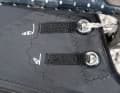 Some sails have two eyelets on the clew. The upper one is recommended for heavy, large surfers or for light winds (slightly tighter leech), the lower one for lighter people or strong winds.