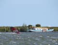 Chris Hafer is feeling good and jibes off the harbour of Andijk.