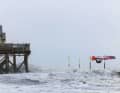 Normally beachgoers park here, but during an autumn storm Nick Spangenberg backloops directly in front of the 54 Grad beach bar in St. Peter-Ording