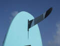 A fin is not included in the scope of delivery, we tested with a 38 MFC fin.