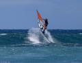 Look out for a nice steep wave and don't forget to unhook from the harness. Remember: speed is your friend and is crucial for a nice rotation. Cheese rolls work even when overpowered.  They also work when underpowered, but then require full physical effort.