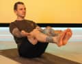 Yoga-Übung Das Boot