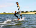 Priceless: The first sense of achievement as a windsurfer. With the right wetsuit, getting started is twice as much fun for children