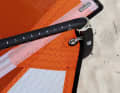 A small notch on the sheet end, a lashing eye.