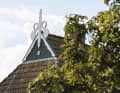 The curved swan-neck gables on the facades of the imposing farmsteads characterise the region...