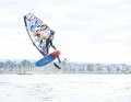 Lennart Neubauer shoots himself up high. Geneva city harbour in the background.