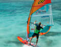 ...and does not hoist the sail until the apex (on a downwind course, i.e. clearly too late.