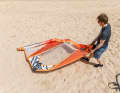 Furl the sail in the direction of the wind