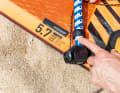 Adjust the mast extension appropriately (luff length minus mast length)
