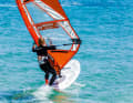 Hold tight with your back hand, hang your body into the sail and shift your weight to your back leg, as the sail draft naturally increases noticeably during the drop. If you keep close hauled during the drop, you will immediately feel your board change direction away from the wind to leeward.