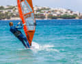 A good trick for cruising on boards without a daggerboard is to deliberately push the windward edge a little deeper into the water. To do this, simply place your front foot slightly away from the centre line towards the windward edge