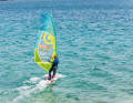 Get some momentum on a half to upwind course and unhook from the harness if necessary