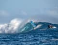 Winner Sarah Hauser in front of one of the beautiful Cloudbreak barrels