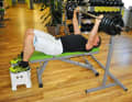 Then push them straight back up again. It is important that you keep your shoulders on the bench and always keep them pulled slightly towards your buttocks.