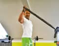 ...and pull the elasticated band backwards. The upper arm is also the axis of rotation here.