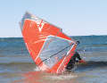 If the technique and wind strength are right, you will land on your back on the lee side of the water. The sail has then completed half to three-quarters of a rotation. Repeat this pre-exercise until it has become second nature to you - apart from the benefits, this exercise is also a lot of fun.