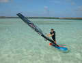 2-3) Luff up until the board is upwind and push the sail forwards towards the bow like a heli tack - it hits back, the board turns out of the wind. The following position (3) is similar to that after a duck in regular stance, which you need for moves such as the Culo. Twist your upper body and hips and hold the sail open with your back hand to avoid being pushed downwind by the board.