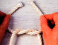 Tie an overhand knot in this position.