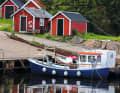 The small fishing huts in Båstad create an idyllic atmosphere.