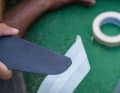 The fin is then taped with crepe on one side as a working base.