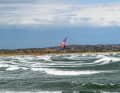 In addition to relaxed shallow water, the island also offers crisp wave spots