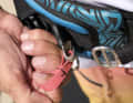 A thin spring plate secures the hook - you should check here whether it has snapped shut properly