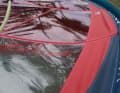 The sail has a clearly visible profile even without wind pressure.