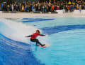 Surfing in the artificial wave at o2 Surftown MUC