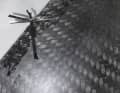 The wafer-thin repair area is then firmly anchored using carbon fibres...